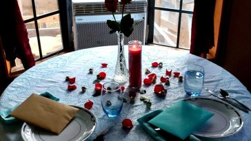 home date table with roses and glasses