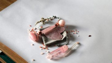 rose quartz bracelet on table